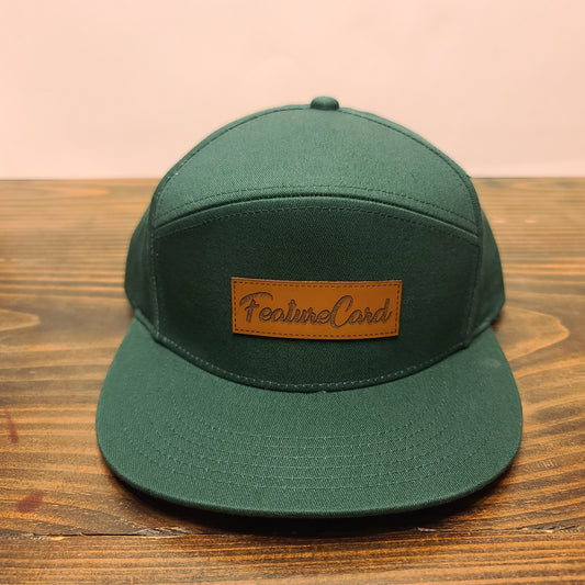 Hat green 7 panel leather patch